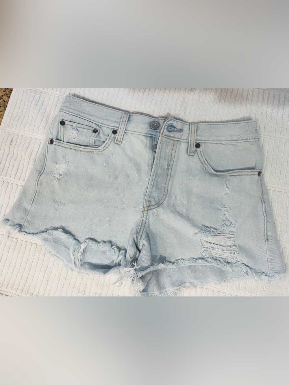 Levi's Women's Light Wash Distressed
Cutoff Denim Shorts Size 28